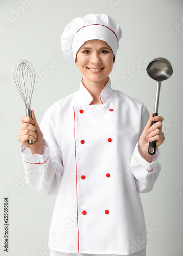 Beautiful female chef on li...