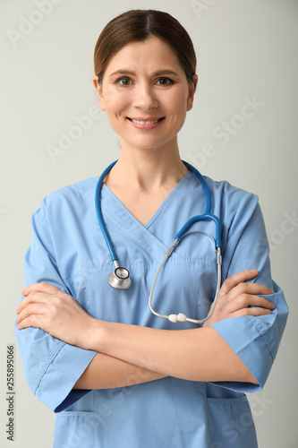 Beautiful female doctor on ...