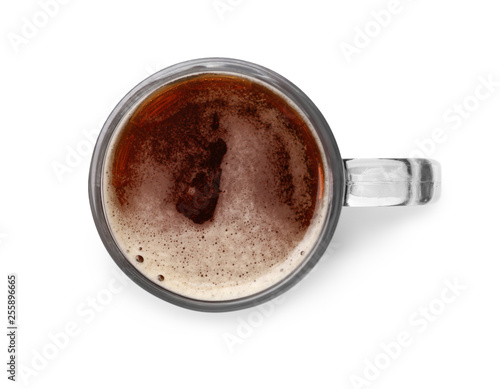 Mug of fresh beer on white background, top view
