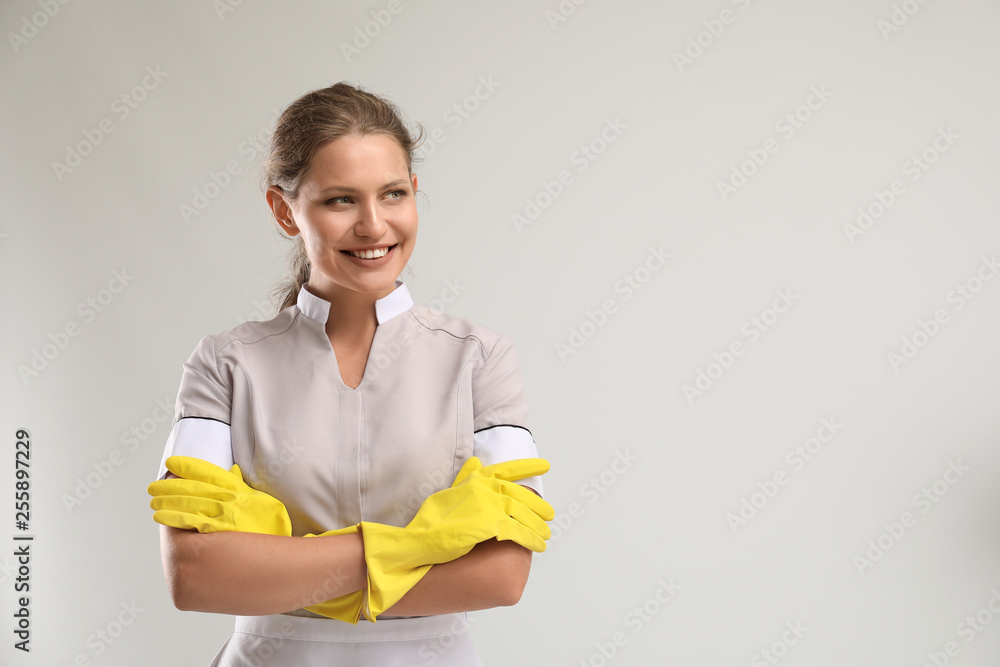 Portrait of beautiful female housekeeper on white background Portrait of beautiful female housekeeper on white background