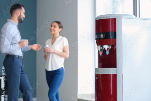Modern water cooler in office