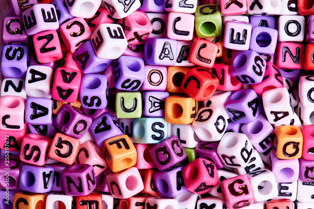 Colored cubes with English letters close-up. Colored cubes with English letters close-up.