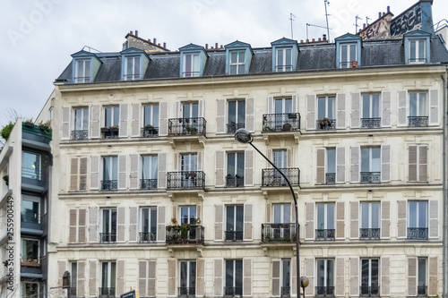 Paris, beautiful building in the center, typical parisian facade in the Marais