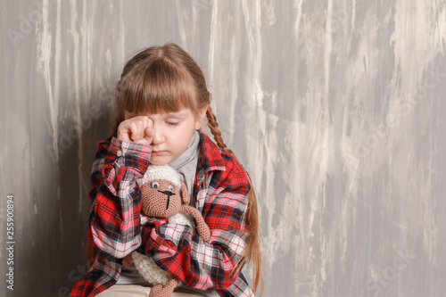 Portrait of sad little girl...