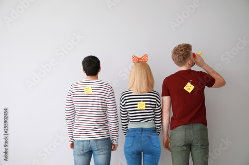 Sticky notes on back of fri...