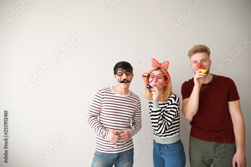 Funny friends with party wh...