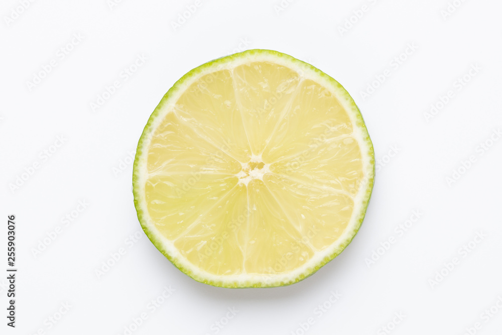 Composition with fresh ripe limes on light background, top view