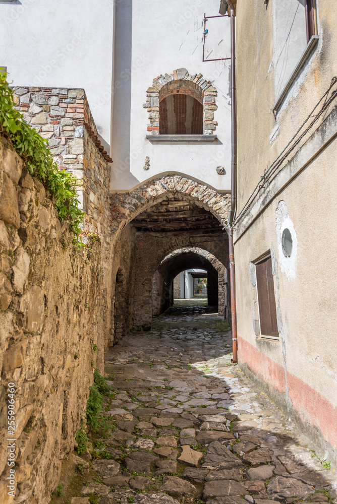 Fototapeta Ancient Street and Archway in Southern Italy