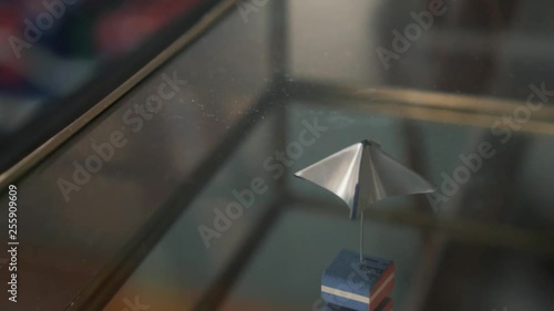 paper pyramid on brooch made for telekinesis photo