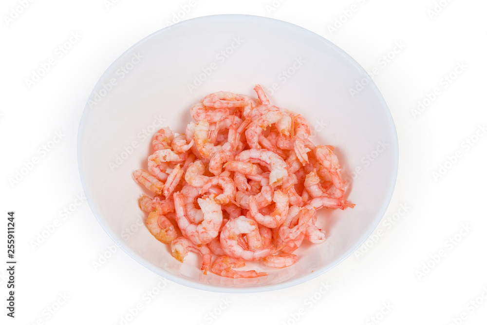 Cooked and peeled shrimp tails in white bowl Cooked and peeled shrimp tails in white bowl