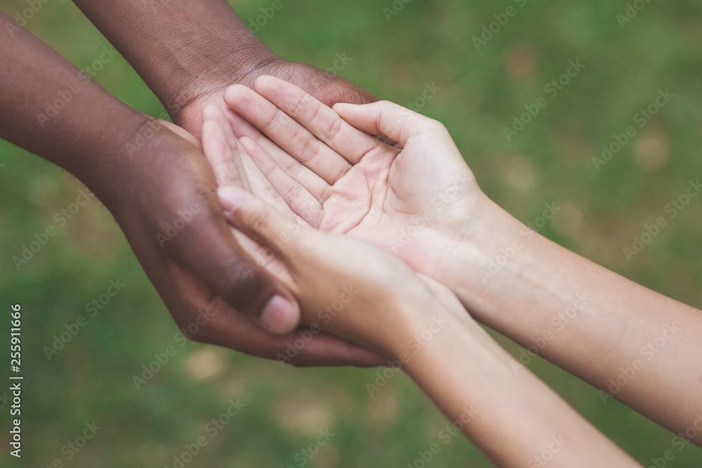 Man and woman hands held together gesturing they need help Man and woman hands held together gesturing they need help