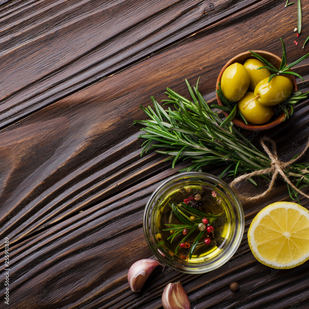 Flat lay Food background frame made of oils condiments and spices on kitchen table. Cooking concept with copy-space Flat lay Food background frame made of oils condiments and spices on kitchen table. Cooking concept with copy-space
