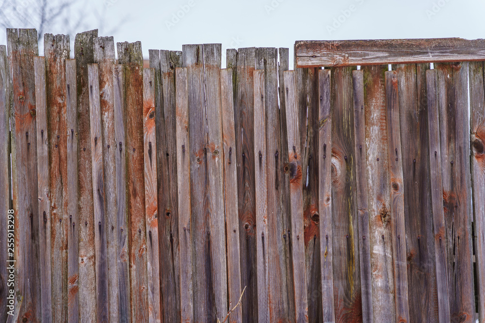 fence around the garden of nailing boards