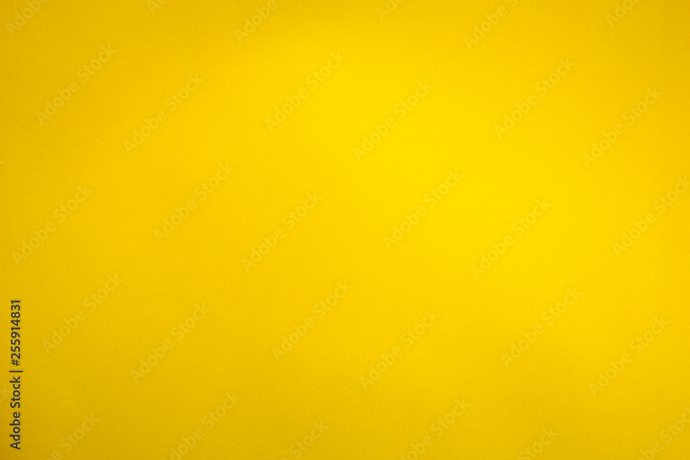 Yellow textured paper background Yellow textured paper background