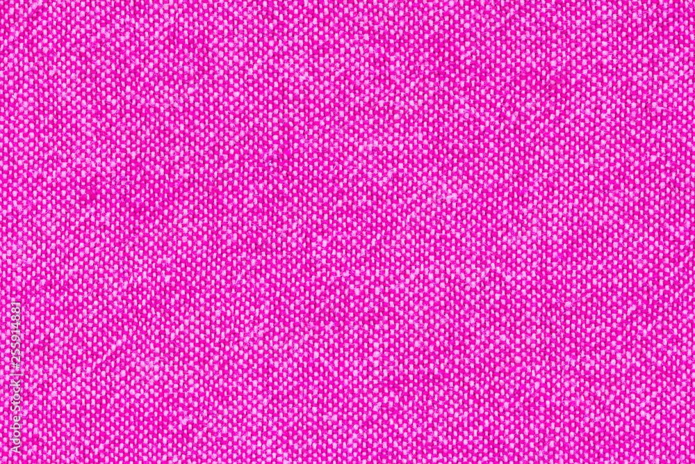 Pink textile texture for background with visible fibers Pink textile texture for background with visible fibers
