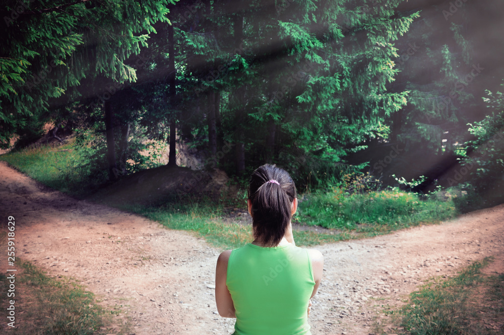 Girl with a choice near the forked road Girl with a choice near the forked road