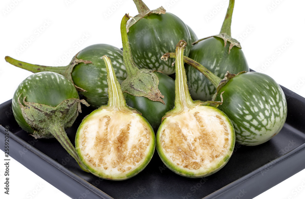 Thai Eggplant - scintific name is (Solanum virginianum L.), half cut Thai Eggplant - scintific name is (Solanum virginianum L.), half cut