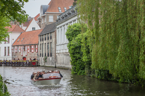 Houses and tree along the canals of Brugge or Bruges