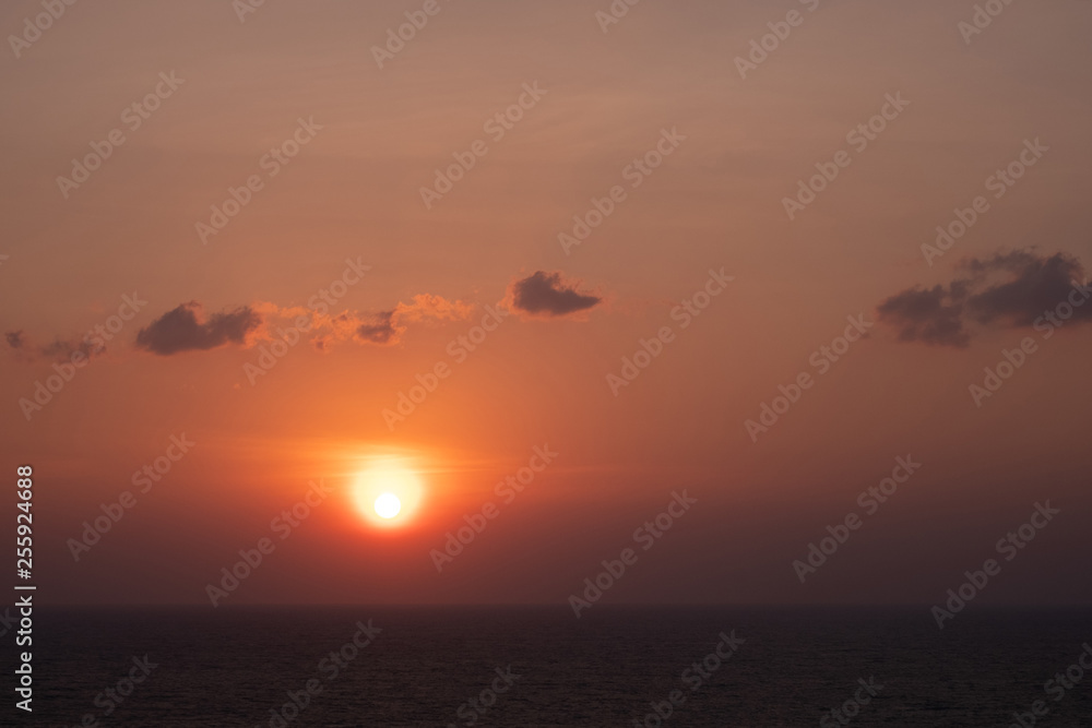 Scenic orange sunset sky background, scenic orange sunrise, relaxing seascape with wide horizon. Scenic orange sunset sky background, scenic orange sunrise, relaxing seascape with wide horizon.