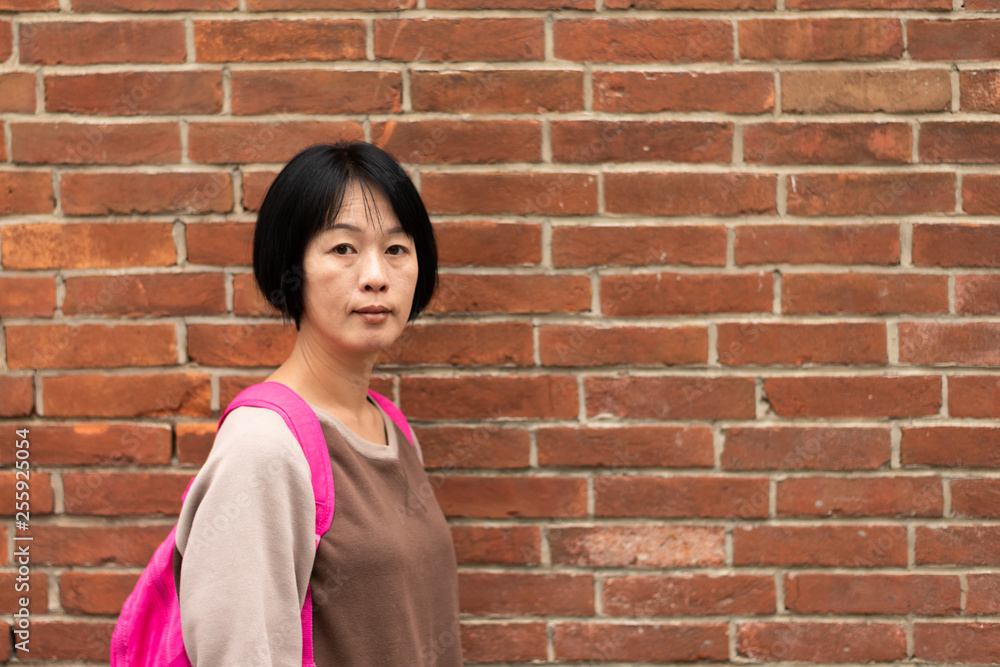 Asian traveling woman with bag Asian traveling woman with bag