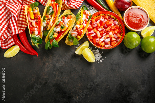 Tasty appetizing tacos with vegetables