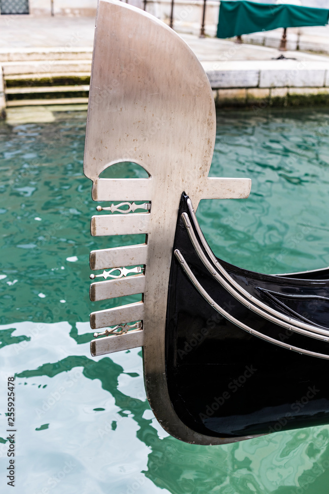 Detail of a gondola on a canal in Venice