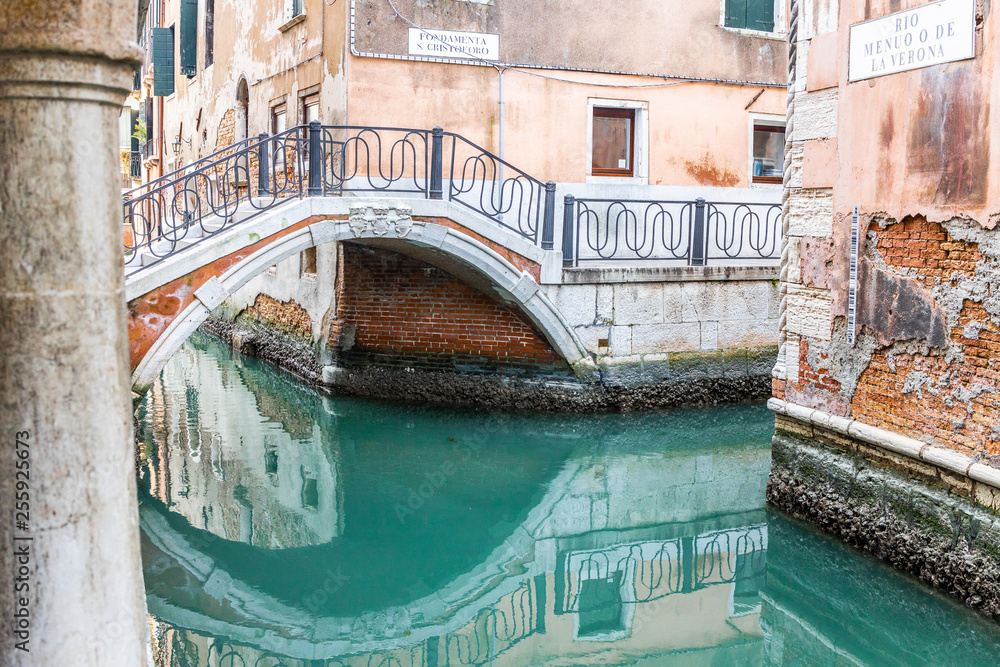 Beautiful bridge on a canal of Venice