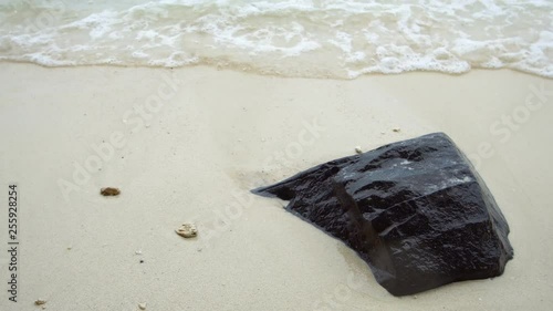 The rock that was billowing in front of the beach
