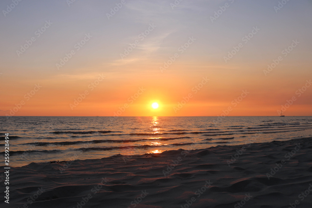 Sunset seascape on the tropical coast beach