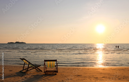 Beach chair on the tropical beach at sunset time © jitanong714