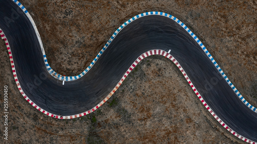 Curving race track view from above, Aerial view car race asphalt track and curve. photo