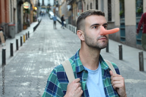 Photos Man with a very long nose outdoors