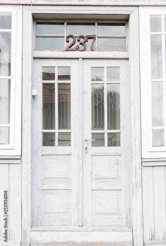Old white wooden style door.