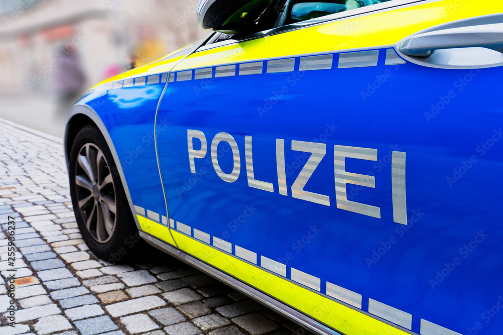 Obraz premium Polizei sign on a German police car