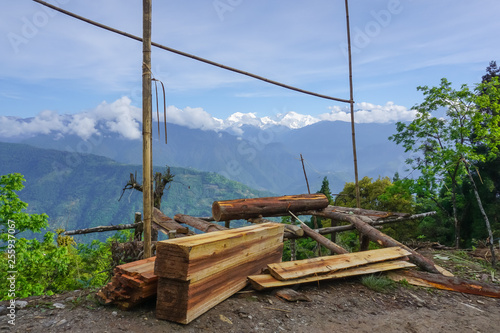 Logs and boards in the Himalayan mountains in Sikkim, India