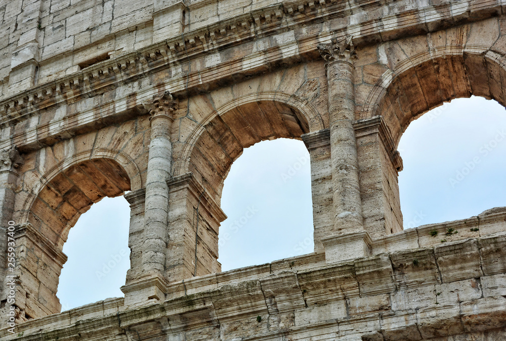 Arches of the Coliseum. Ancient architecture. The Coliseum is an amphitheatre in the centre of the city of Rome, Italy. It is the largest amphitheatre ever built. Landmarks of Italy.