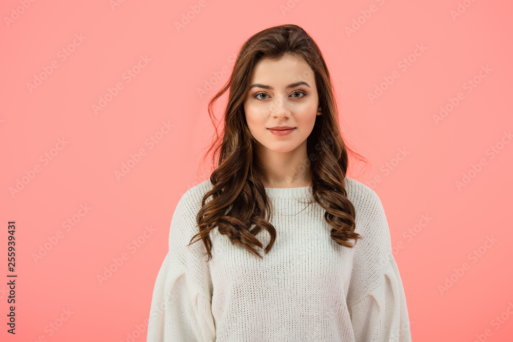 smiling and attractive woman in white sweater looking at camera isolated on pink smiling and attractive woman in white sweater looking at camera isolated on pink