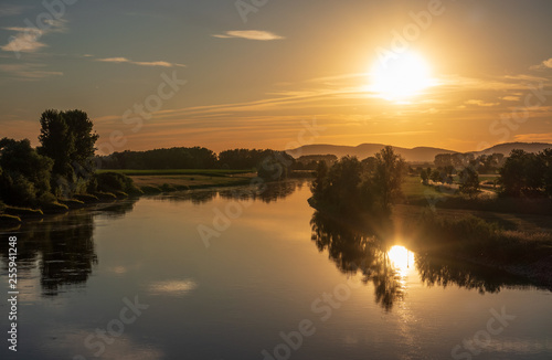 The sunset over river Weser in Germany