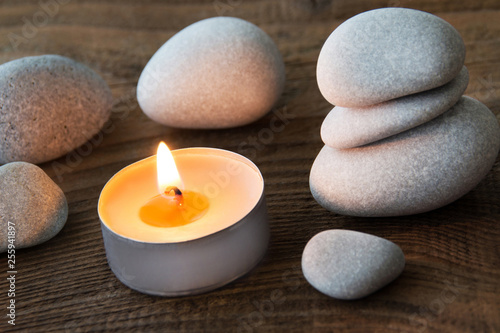 Wellness decoration with candle and stones