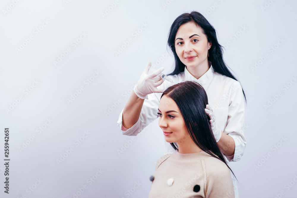 Young woman with hair loss problem receiving injection, with place for your inscription Young woman with hair loss problem receiving injection, with place for your inscription