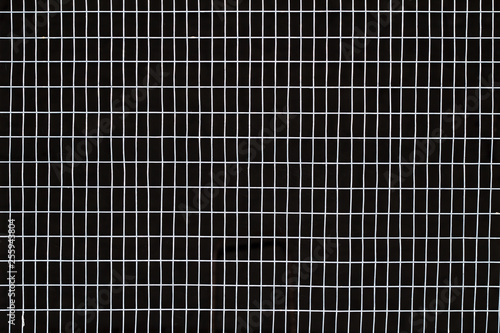 Texture square grid on a black background.