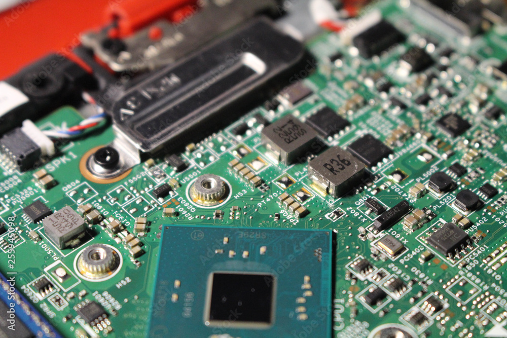 Closeup view at laptop motherboard and components. Closeup view at laptop motherboard and components.