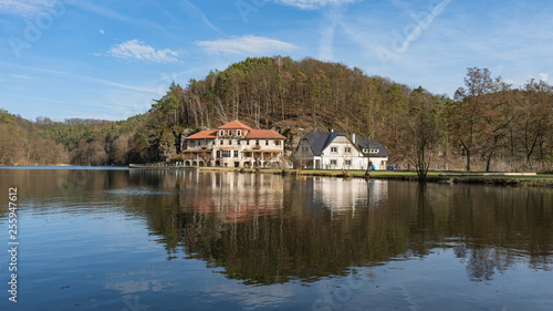  View on Old decaying hotel at beatiful lake in Czech Republic (Harasov). photo