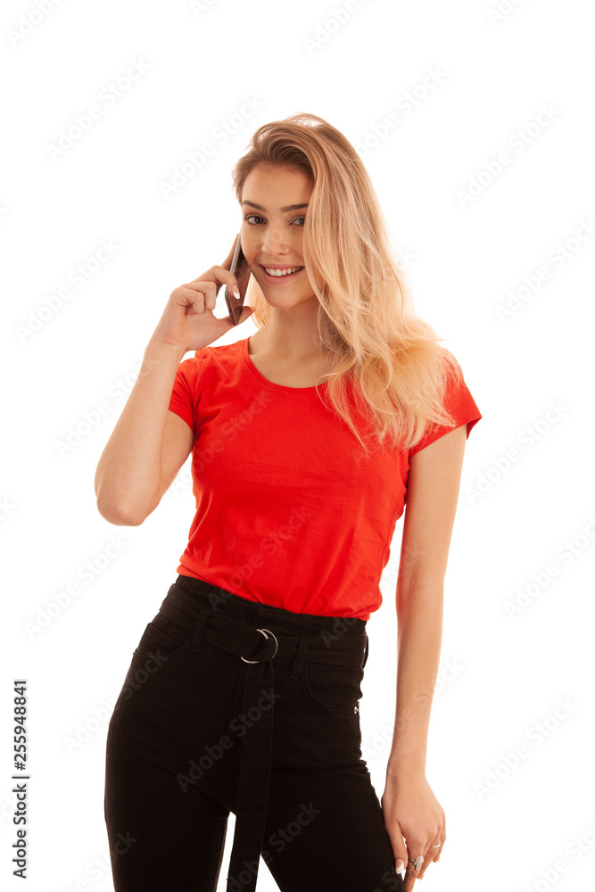 Beautiful young woman in red t shirt speak on a smart phone isolated over white background - phone chat Beautiful young woman in red t shirt speak on a smart phone isolated over white background - phone chat