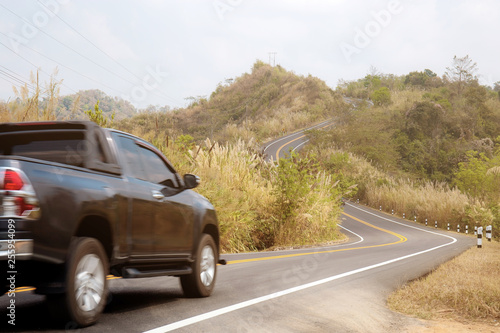 Car are driving on street.