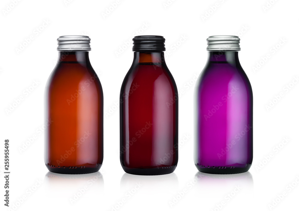Glass bottles of botanical energy drink on white Glass bottles of botanical energy drink on white