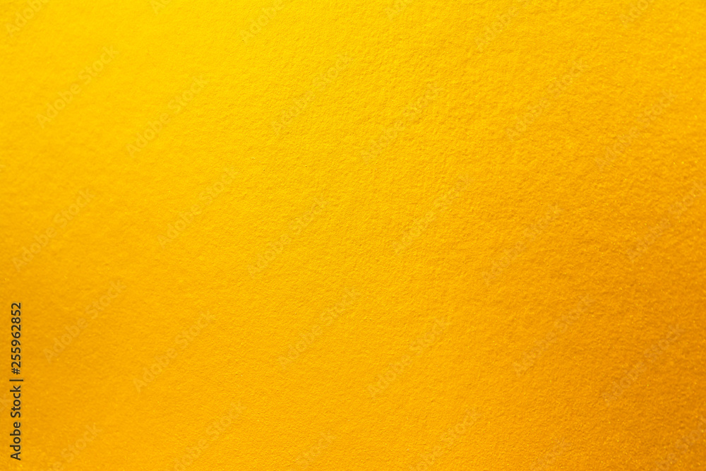Yellow and orange gold color texture background. Gold texture surface