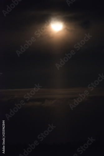 Moonrise and light pole from the moon on the ground