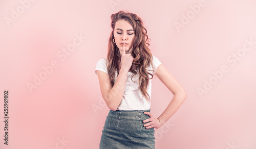 Portrait of a young girl on a colored background © puhimec