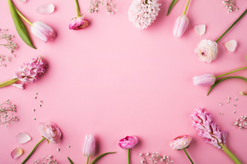 Various of pink flowers on a pink background.